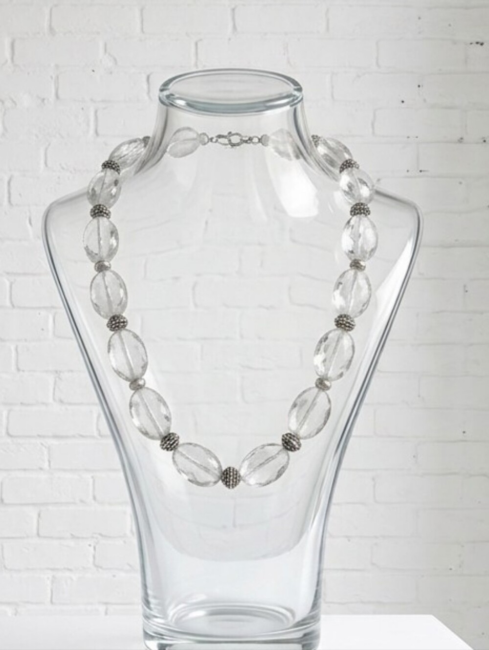 Clear crystal quartz on sterling silver - with D charm as maker mark